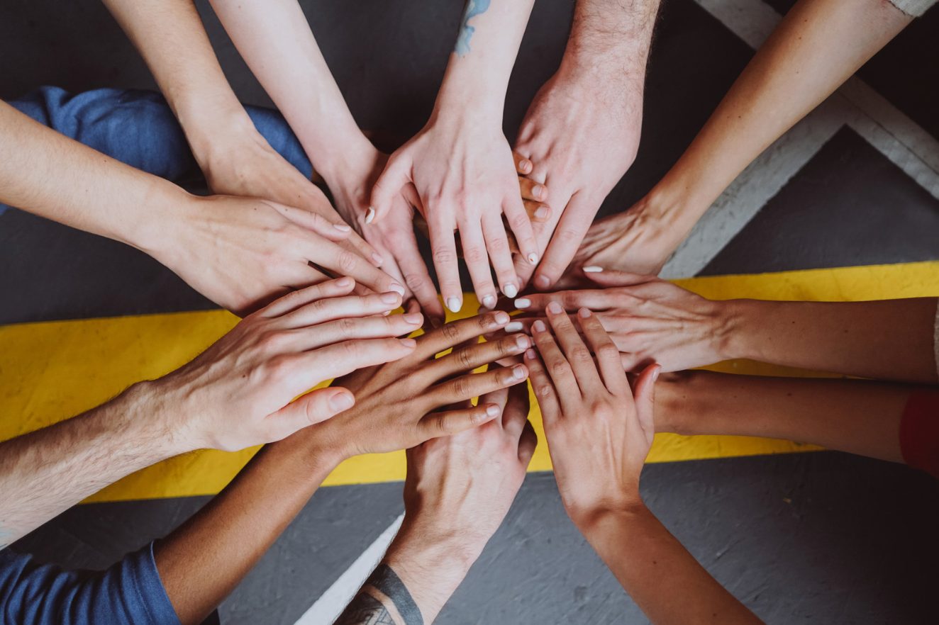 Hands joined together, representing the FairPlay group